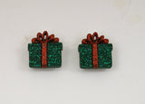 Green Christmas Gift Package With Red Bow