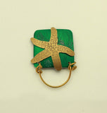 Hand Engraved Bronze Starfish on Blue or Green Square Magnetic Eyeglass Holder - Laura Wilson Gallery 