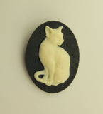 Handmade Faux Ivory Cat on Black Oval Magnetic Brooch or Eyeglass Holder - Laura Wilson Gallery 